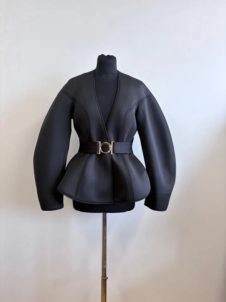 Black neoprene belted peplum jacket cut and made in the studio